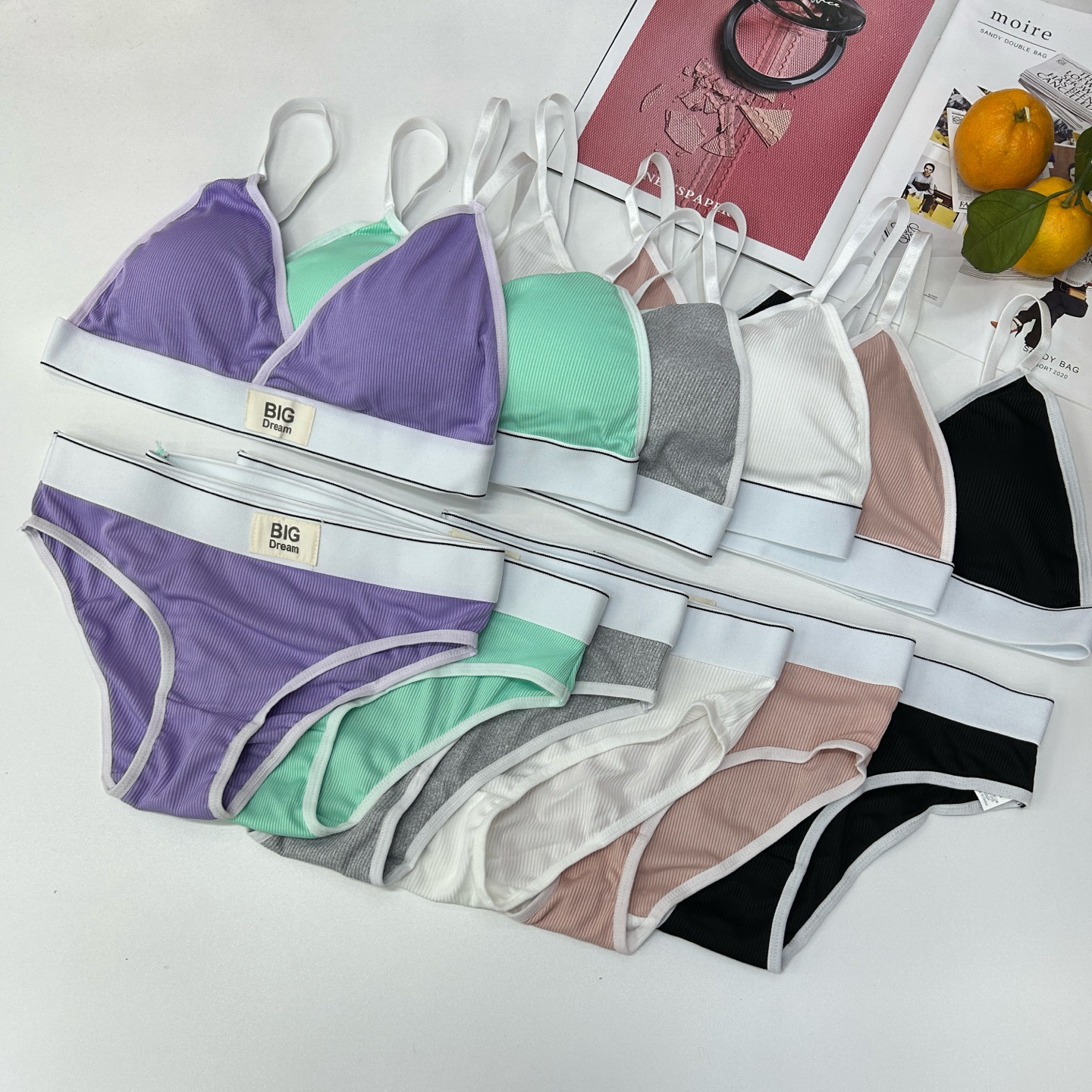 外贸出口欧美非洲现货吊带式内衣套装带胸垫运动美背无钢圈。