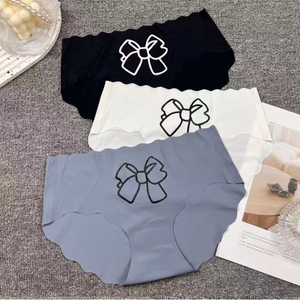 外贸库存内裤出口欧美冰丝无痕内裤中腰蝴蝶结内裤女一片式三角裤