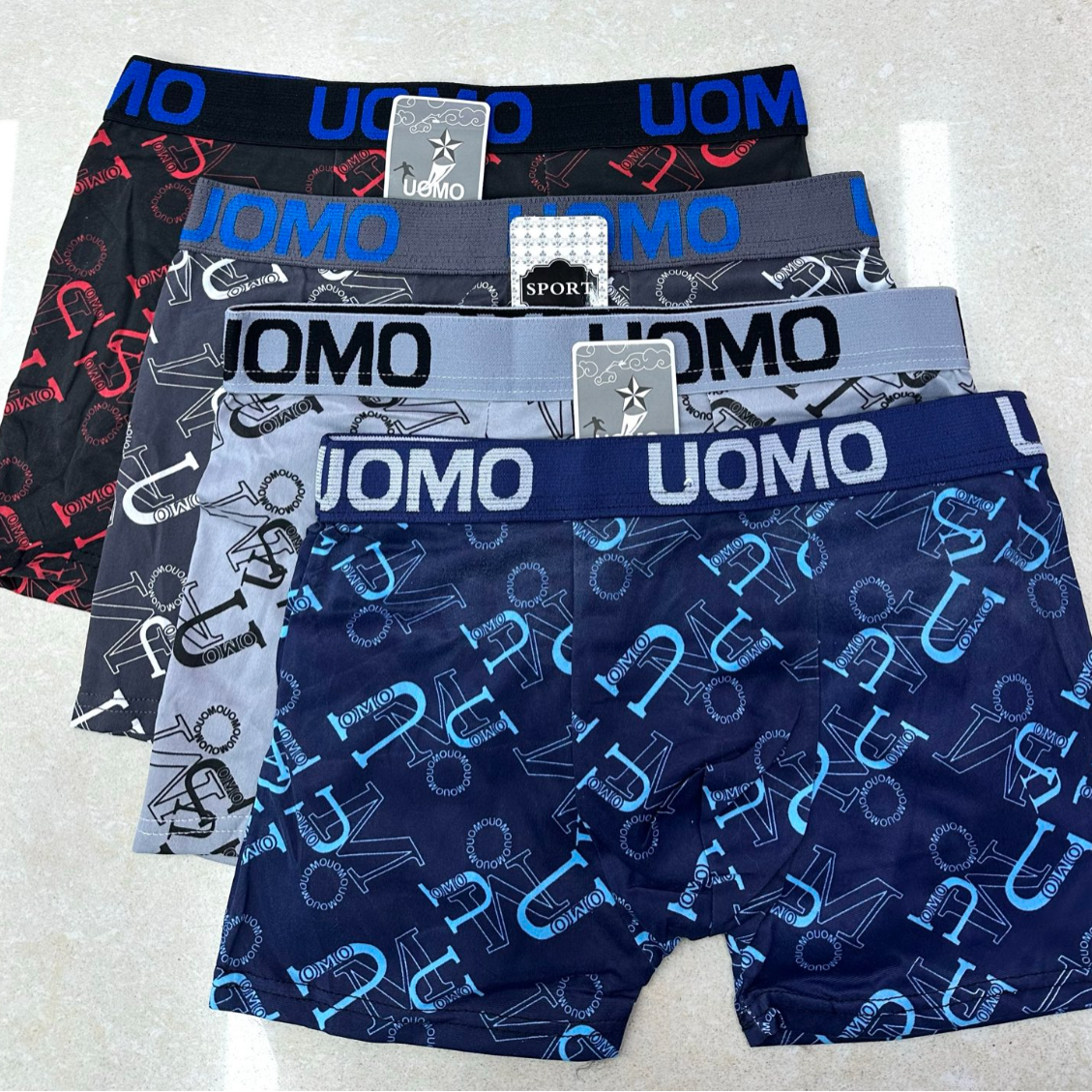 外贸出口欧美非洲现货库存纯色撞色腰头字母边印花男士平角内裤。